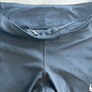 Nike Dri-FIT Black Leggings. 3/4 length, 30 inches length.